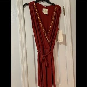 Sexy sz med NWT romper  color is rust